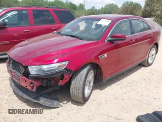 2013 Ford Taurus SEL z VIN 1FAHP2E81DG187454, wystawiony jako IAAI lot #42170990 z przebiegiem 76 739 mil mil oraz . Historia ofert i sprzedaży dostępna na DreamBid. Obrazek 2.