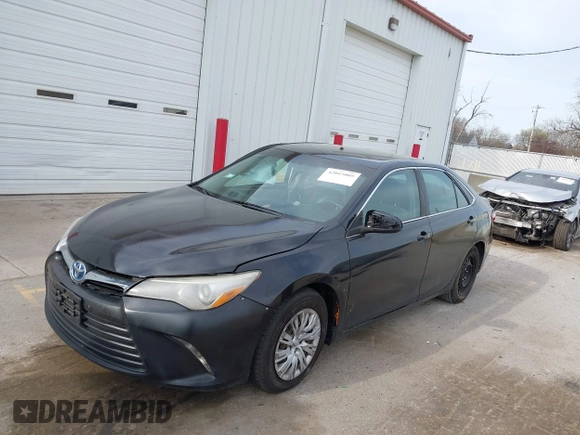2015 Toyota Camry LE with VIN 4T1BD1FK6FU157623, listed as a IAAI auction lot 42015005 with 300,974 mi miles and . Bid and sale history available at DreamBid. Image 18.