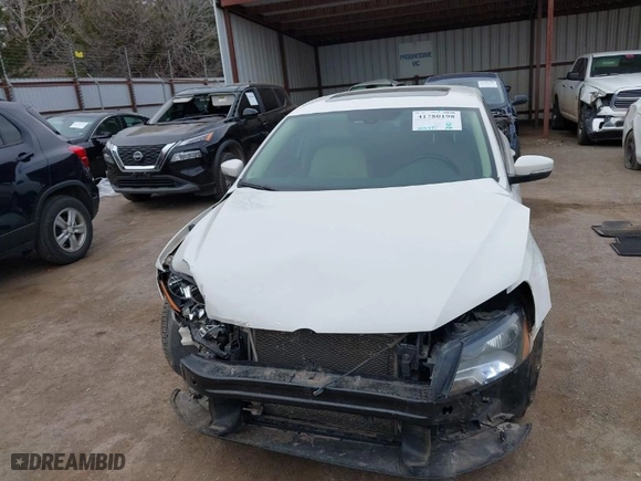 2013 Volkswagen Passat TDI SEL Premium with VIN 1VWCN7A3XDC118087, listed as a IAAI auction lot 41780198 with 305,872 mi miles. Bid and sale history available at carsss.com. Image 12.