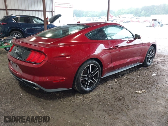 2018 Ford Mustang EcoBoost with VIN 1FA6P8TH7J5101309, listed as a IAAI auction lot 42211115 with 70,661 mi miles and . Bid and sale history available at DreamBid. Image 4.