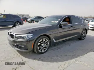 2018 BMW 5 Series 530e xDrive with VIN WBAJB1C56JB084789, listed as a Copart auction lot 49358125 with 105,567 mi miles and Clean Title. Bid and sale history available at carsss.com. Image 1.