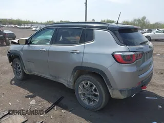 2020 Jeep Compass Trailhawk with VIN 3C4NJDDB4LT171685, listed as a IAAI auction lot 42168366 with 76,390 mi miles and . Bid and sale history available at DreamBid. Image 3.