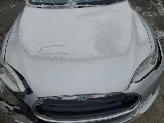 2013 Tesla Model S with VIN 5YJSA1AC9DFP10705, listed as a Copart auction lot 89394665 with Not Provided miles and Salvage Title. Bid and sale history available at carsss.com. Image 12.