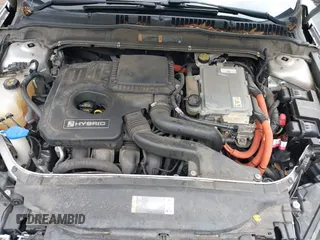 2013 Ford Fusion SE Hybrid z VIN 3FA6P0LU1DR291060, wystawiony jako IAAI lot #42731674 z przebiegiem 93 918 mil mil oraz . Historia ofert i sprzedaży dostępna na DreamBid. Obrazek 10.