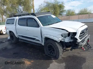 2019 Toyota Tacoma SR z VIN 3TMCZ5AN6KM284101, wystawiony jako IAAI lot #41099466 z przebiegiem 36 119 mil mil oraz . Historia ofert i sprzedaży dostępna na DreamBid. Obrazek 1.