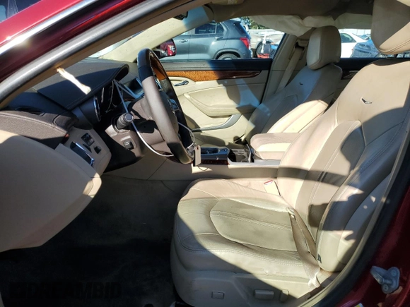 2010 Cadillac CTS with VIN 1G6DM5EG0A0145228, listed as a Copart auction lot 79017924 with 139,886 mi miles and Salvage Title. Bid and sale history available at DreamBid. Image 7.