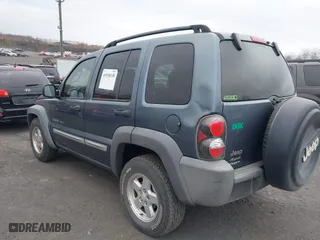 2002 Jeep Liberty Sport with VIN 1J8GL48K62W298212, listed as a IAAI auction lot 41918130 with 226,299 mi miles. Bid and sale history available at carsss.com. Image 3.