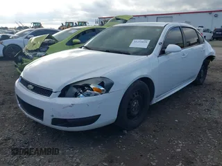 2013 Chevrolet Impala Police with VIN 2G1WD5E38D1124003, listed as a IAAI auction lot 41231039 with 172,366 mi miles. Bid and sale history available at carsss.com. Image 2.