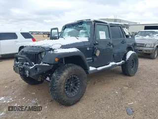 2017 Jeep Wrangler Unlimited Sport with VIN 1C4BJWDG4HL748681, listed as a IAAI auction lot 41265831 with 76,169 mi miles. Bid and sale history available at carsss.com. Image 2.