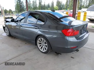 2013 BMW 3 Series 328i with VIN WBA3C1G51DNN94132, listed as a IAAI auction lot 42259019 with 96,875 mi miles and . Bid and sale history available at DreamBid. Image 3.