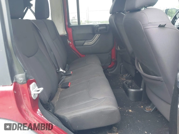 2013 Jeep Wrangler Unlimited Sport with VIN 1C4HJWDG7DL516077, listed as a IAAI auction lot 42521985 with 169,299 mi miles and . Bid and sale history available at DreamBid. Image 8.