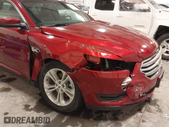 2014 Ford Taurus SEL z VIN 1FAHP2E83EG137639, wystawiony jako IAAI lot #41535259 z przebiegiem 62 978 mil mil oraz . Historia ofert i sprzedaży dostępna na DreamBid. Obrazek 6.