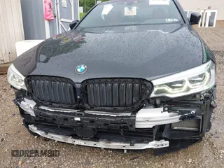 2018 BMW 5 Series M550i xDrive with VIN WBAJB9C5XJB286923, listed as a IAAI auction lot 42527301 with 76,923 mi miles and . Bid and sale history available at DreamBid. Image 17.