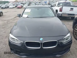 2018 BMW 3 Series 320i with VIN WBA8E1G51JNU91319, listed as a IAAI auction lot 41690084 with 67,609 mi miles. Bid and sale history available at carsss.com. Image 12.