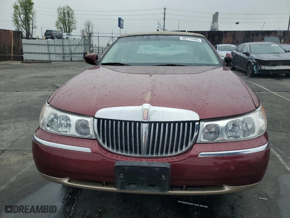 1999 Lincoln Town Car Signature with VIN 1LNHM82W7XY612906, listed as a Copart auction lot 50777435 with 110,414 mi miles and Salvage Title. Bid and sale history available at carsss.com. Image 5.