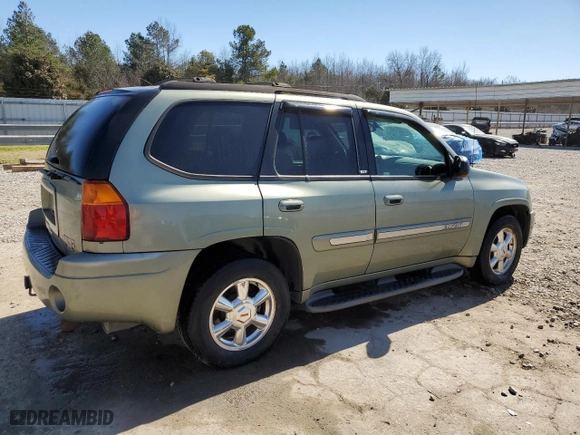 2003 GMC Envoy SLT with VIN 1GKDS13S932203853, listed as a Copart auction lot 46364585 with 130,681 mi miles and Salvage Title. Bid and sale history available at carsss.com. Image 3.