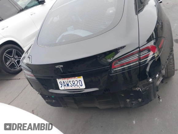 2022 Tesla Model S with VIN 5YJSA1E55NF474342, listed as a IAAI auction lot 41870994 with 33,804 mi miles and . Bid and sale history available at DreamBid. Image 17.