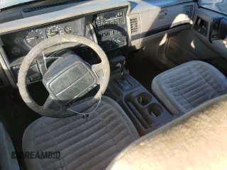 1995 Jeep Grand Cherokee Laredo with VIN 1J4FX58S5SC741328, listed as a Copart auction lot 82034594 with 260,398 mi miles and Clean Title. Bid and sale history available at carsss.com. Image 8.