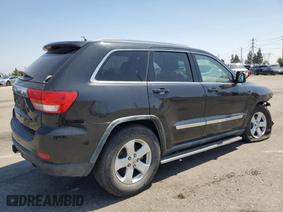 2011 Jeep Grand Cherokee Laredo with VIN 1J4RR4GG0BC563603, listed as a Copart auction lot 60237475 with 243,885 mi miles and Salvage title. Bid and sale history available at DreamBid. Image 3.