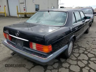 1990 Mercedes-Benz 420 with VIN WDBCA35E8LA539818, listed as a Copart auction lot 45764444 with 219,036 mi miles and Salvage Title. Bid and sale history available at carsss.com. Image 3.