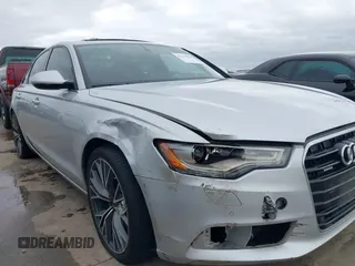 2015 Audi A6 Premium Plus z VIN WAUGFAFC8FN032627, wystawiony jako IAAI lot #41270302 z przebiegiem 82 104 mil mil oraz . Historia ofert i sprzedaży dostępna na DreamBid. Obrazek 6.
