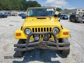 2004 Jeep Wrangler Sport with VIN 1J4FA49S84P753317, listed as a Copart auction lot 55872965 with 185,763 mi miles and Salvage title. Bid and sale history available at DreamBid. Image 5.