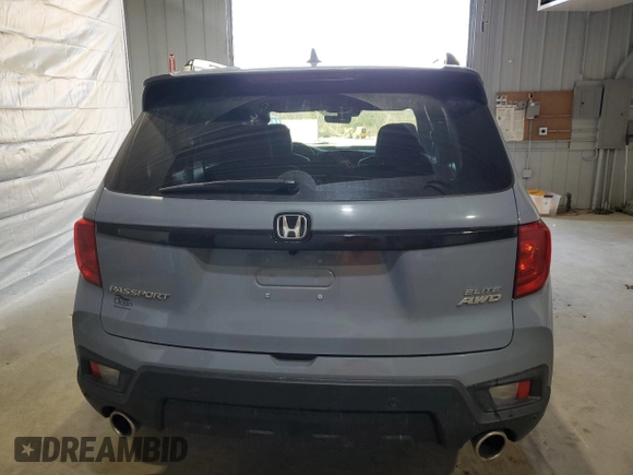 2023 Honda Passport Elite with VIN 5FNYF8H03PB034613, listed as a Copart auction lot 54009215 with 102,841 mi miles and Salvage title. Bid and sale history available at DreamBid. Image 6.