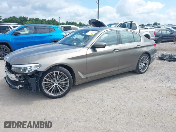 2018 BMW 5 Series 530i xDrive with VIN WBAJA7C55JG909519, listed as a IAAI auction lot 42650263 with 57,077 mi miles and . Bid and sale history available at DreamBid. Image 2.