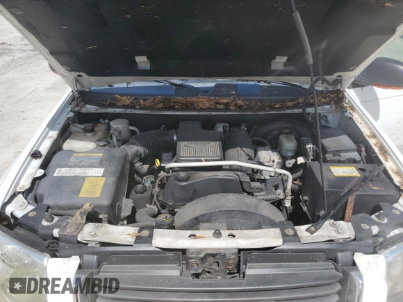2005 GMC Envoy SLT with VIN 1GKDT13S052311455, listed as a Copart auction lot 73635434 with Not Provided miles and Salvage Title. Bid and sale history available at DreamBid. Image 13.