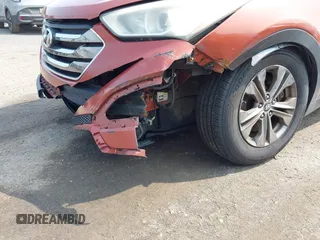 2014 Hyundai Santa Fe z VIN 5XYZTDLB0EG208769, wystawiony jako IAAI lot #42485411 z przebiegiem 82 173 mil mil oraz . Historia ofert i sprzedaży dostępna na DreamBid. Obrazek 6.