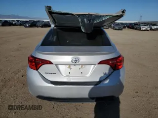 2019 Toyota Corolla L с VIN 2T1BURHE9KC138405, выставлен на аукционе Copart как лот 52054075 с пробегом 152 911 миль миль и Списание • Salvage title. История ставок и продаж доступна на DreamBid. Изображение 6.