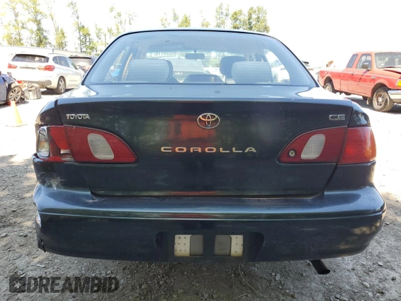 1999 Toyota Corolla VE with VIN 1NXBR12E7XZ240321, listed as a Copart auction lot 64259115 with 144,145 mi miles and Salvage title. Bid and sale history available at DreamBid. Image 6.