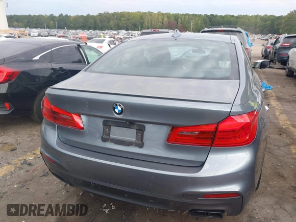 2018 BMW 5 Series M550i xDrive with VIN WBAJB9C53JB286035, listed as a IAAI auction lot 40590380 with 57,072 mi miles and . Bid and sale history available at carsss.com. Image 16.