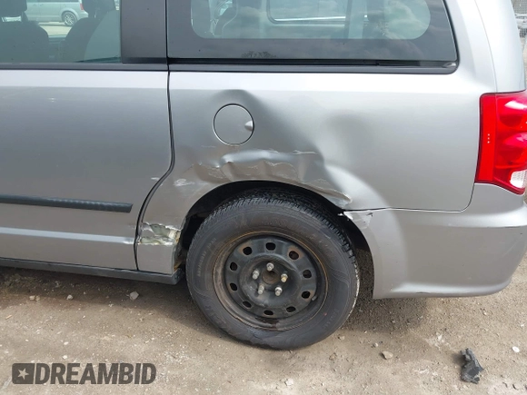 2016 Dodge Grand Caravan SE with VIN 2C4RDGBG5GR251689, listed as a IAAI auction lot 42149865 with 137,410 mi miles and . Bid and sale history available at DreamBid. Image 6.