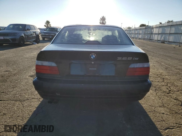 1999 BMW 3 Series 328is with VIN WBABG133XXET07976, listed as a Copart auction lot 67804724 with 139,337 mi miles and Salvage Title. Bid and sale history available at carsss.com. Image 6.