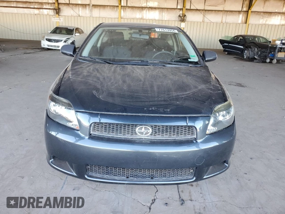 2005 Scion tC with VIN JTKDE177950027533, listed as a Copart auction lot 77613954 with 179,691 mi miles and Salvage Title. Bid and sale history available at carsss.com. Image 5.