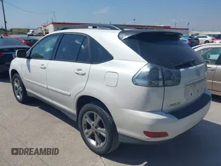 2006 Lexus RX 400h with VIN JTJHW31U560034896, listed as a IAAI auction lot 42053635 with 189,409 mi miles and . Bid and sale history available at DreamBid. Image 3.