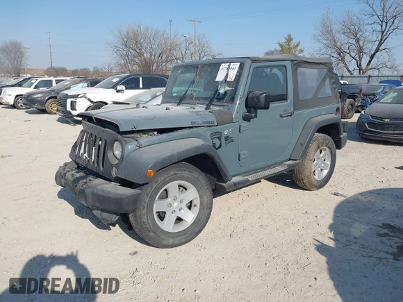 2014 Jeep Wrangler Sport with VIN 1C4AJWAG5EL271318, listed as a IAAI auction lot 41780040 with 128,942 mi miles and . Bid and sale history available at DreamBid. Image 2.