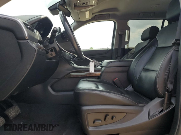 2020 Chevrolet Tahoe LT with VIN 1GNSKBKC7LR162186, listed as a Copart auction lot 56729325 with 114,210 mi miles and Salvage title. Bid and sale history available at DreamBid. Image 7.