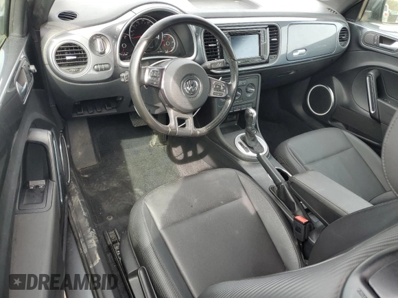 2016 Volkswagen Beetle SE с VIN 3VWJ17AT5GM635173, выставлен на аукционе Copart как лот 50419645 с пробегом 77 583 миль миль и Списание • Salvage title. История ставок и продаж доступна на DreamBid. Изображение 8.