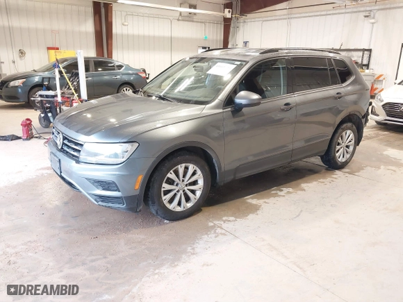 2018 Volkswagen Tiguan S with VIN 3VV1B7AX7JM106531, listed as a IAAI auction lot 41668403 with 119,885 mi miles. Bid and sale history available at carsss.com. Image 18.