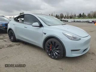 2022 Tesla Model Y Performance with VIN 7SAYGDEF2NF416730, listed as a Copart auction lot 47657945 with 40,738 mi miles and Salvage Title. Bid and sale history available at DreamBid. Image 4.
