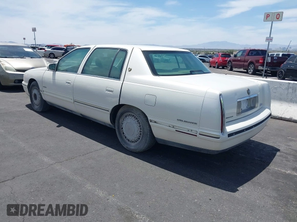 1999 Cadillac DeVille DHS z VIN 1G6KE54Y3XU714363, wystawiony jako IAAI lot #42257217 z przebiegiem 287 542 mil mil oraz . Historia ofert i sprzedaży dostępna na DreamBid. Obrazek 3.