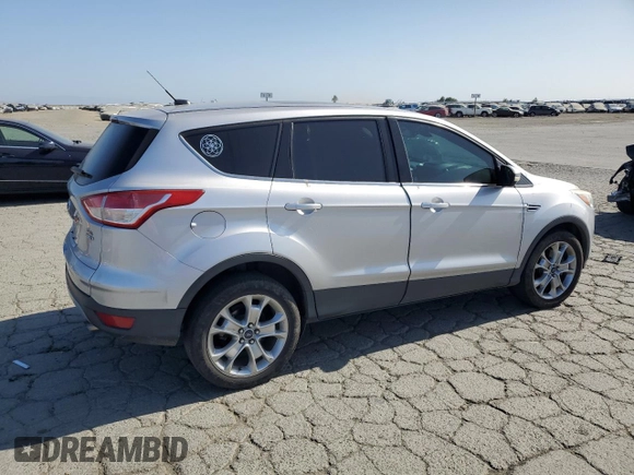 2013 Ford Escape SEL с VIN 1FMCU9H97DUD80585, выставлен на аукционе Copart как лот 60882115 с пробегом 171 254 миль миль и Чистый • Clean title. История ставок и продаж доступна на DreamBid. Изображение 3.