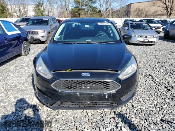 2018 Ford Focus SE with VIN 1FADP3FE9JL306394, listed as a Copart auction lot 52902175 with 77,338 mi miles and Salvage title. Bid and sale history available at DreamBid. Image 5.