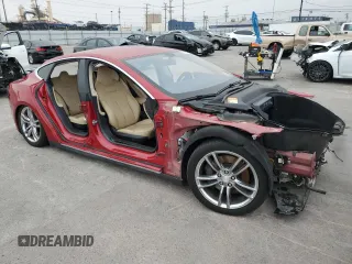 2013 Tesla Model S with VIN 5YJSA1AC2DFP10593, listed as a Copart auction lot 55055115 with Not Provided miles and Clean Title. Bid and sale history available at DreamBid. Image 4.