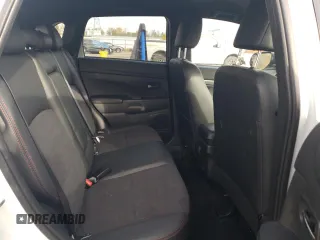 2022 Mitsubishi Outlander Sport SE z VIN JA4AJVAW2NU606282, wystawiony jako Copart lot #73378103 z przebiegiem 21 230 mil mil oraz . Historia ofert i sprzedaży dostępna na DreamBid. Obrazek 11.