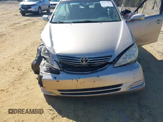2006 Toyota Camry STD z VIN 4T1BE30K06U126692, wystawiony jako IAAI lot #42335766 z przebiegiem 74 000 mil mil oraz . Historia ofert i sprzedaży dostępna na DreamBid. Obrazek 6.