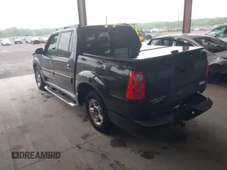 2004 Ford Explorer Sport Trac XLS z VIN 1FMZU77K94UA82414, wystawiony jako IAAI lot #42253012 z przebiegiem 202 018 mil mil oraz . Historia ofert i sprzedaży dostępna na DreamBid. Obrazek 3.