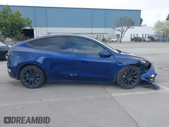 2022 Tesla Model Y Long Range with VIN 7SAYGDEE6NF480146, listed as a IAAI auction lot 41906361 with 31,939 mi miles and . Bid and sale history available at carsss.com. Image 13.